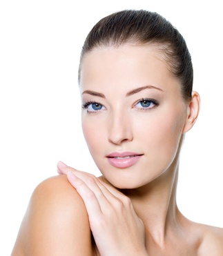 Face of a sexy beautiful young woman with clean skin on a white background